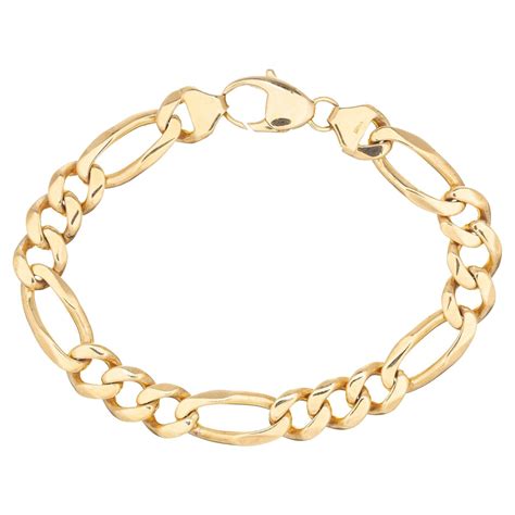 14K Yellow Gold Polished Figaro Link Bracelet .